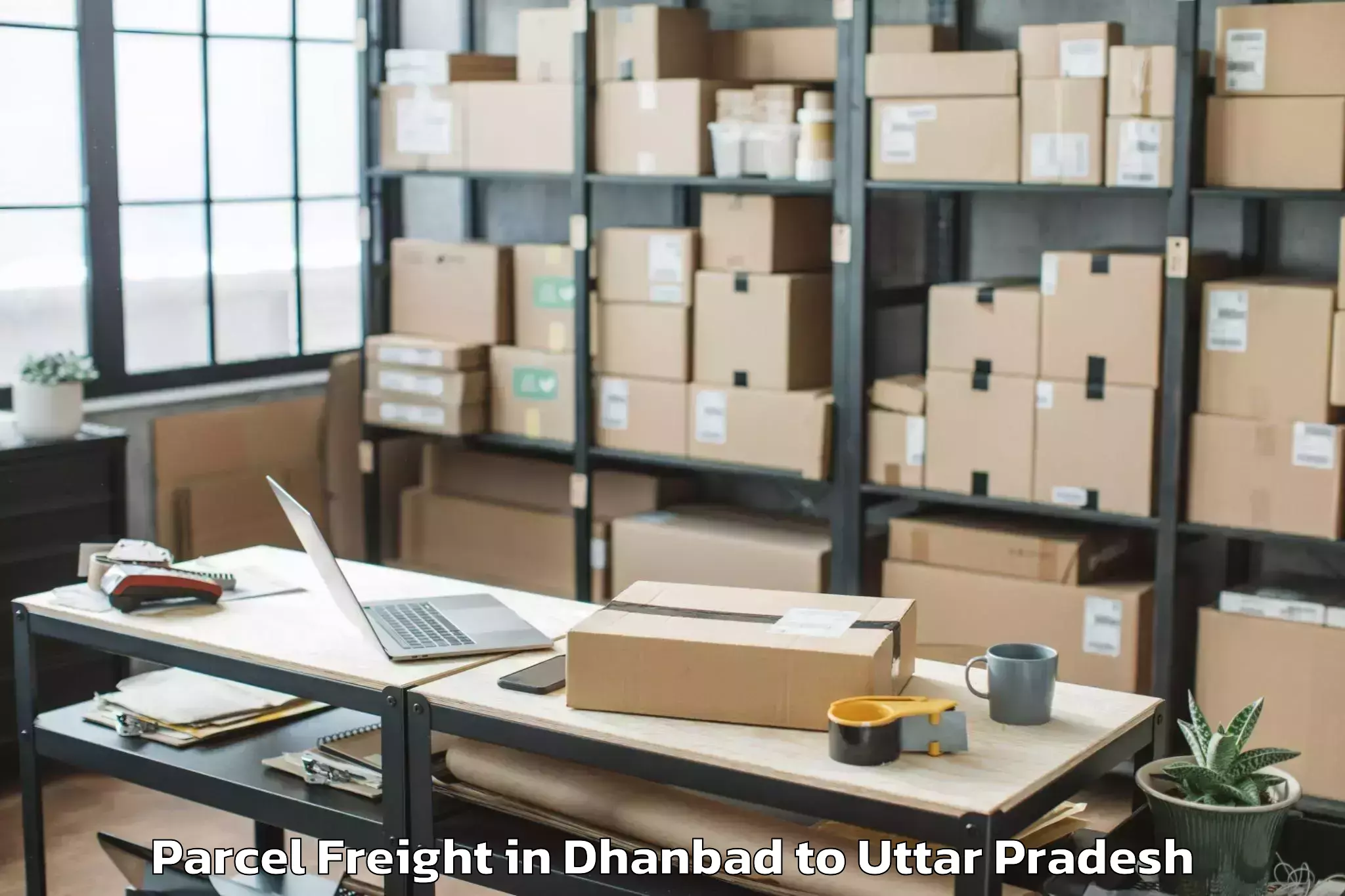 Easy Dhanbad to Unnao Parcel Freight Booking